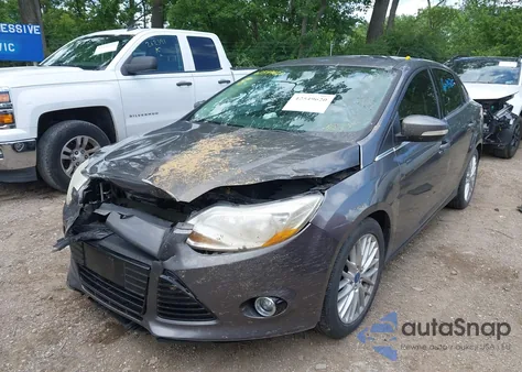 2014 Ford Focus Titanium from USA, damaged, VIN 1FADP3J25EL154679